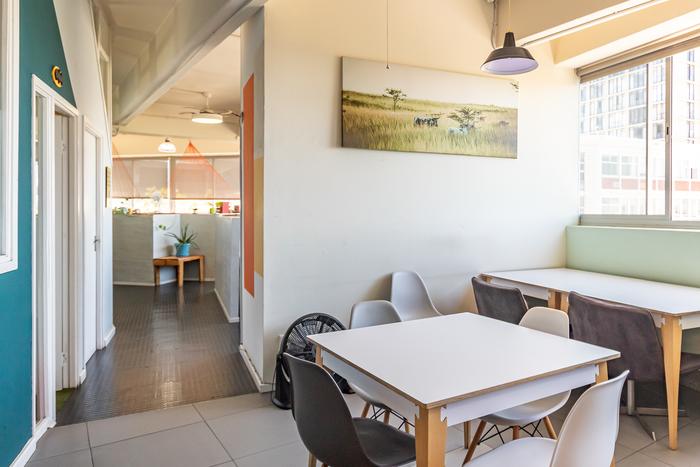 Sunny dining nook seating at Cape Town Office