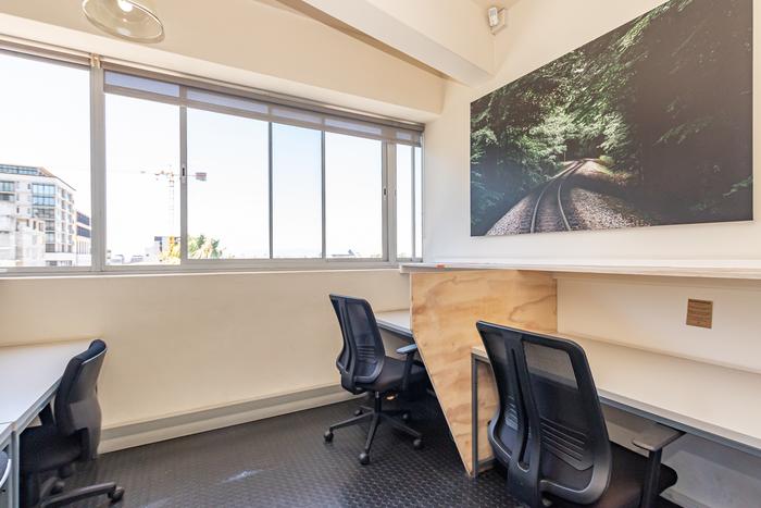 Meeting room with artwork and city views at Cape Town Office