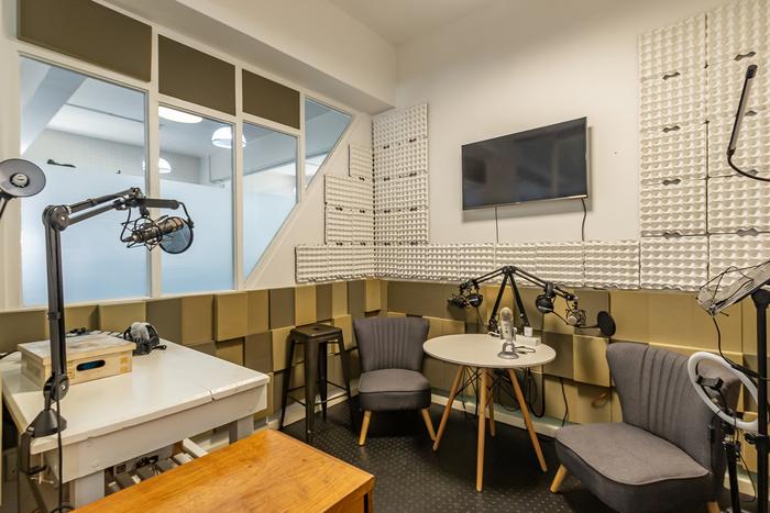 Soundproofed podcast studio with microphones at Cape Town Office