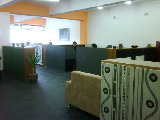 Early Cape Town Office with yellow walls and desk pods, 2011