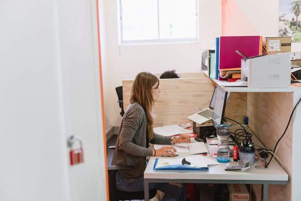A member at her desk at Cape Town Office, 2016