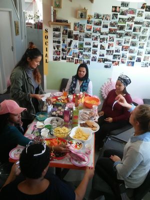 Members sharing a lunch at Cape Town Office, 2017